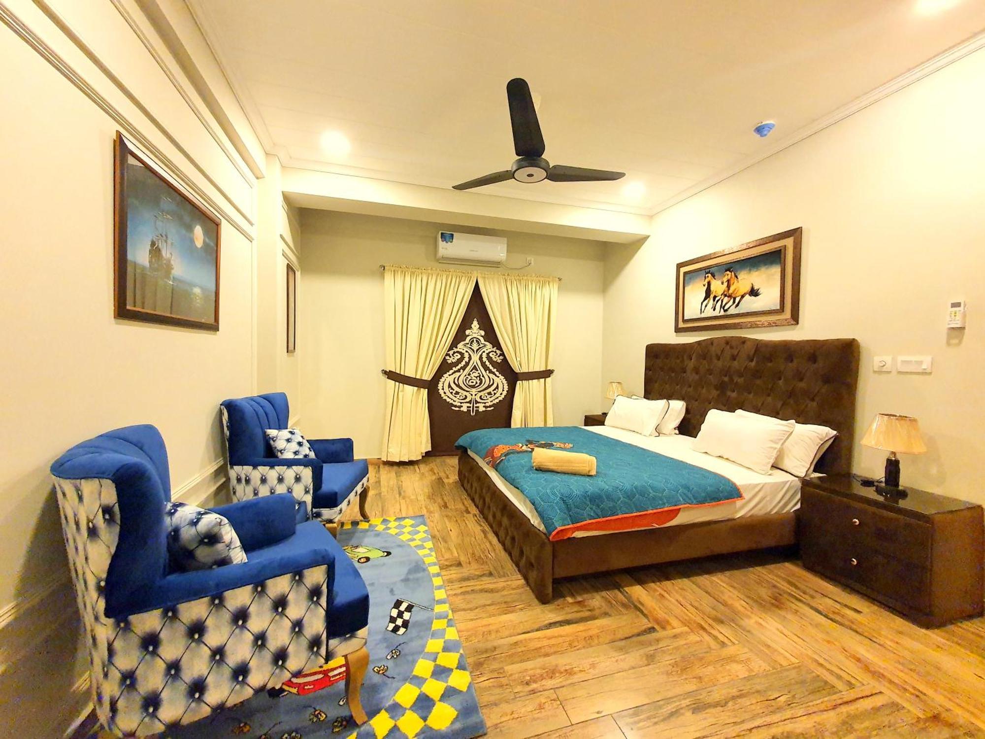 רוואלפינדי Luxurious Landing Apartments & Suites Bahria Town חדר תמונה